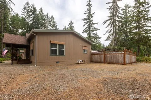 a view of backyard of house