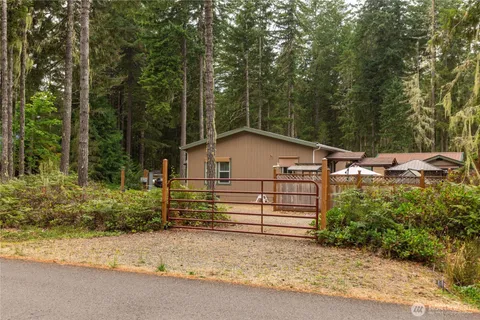 a view of a house with a small yard