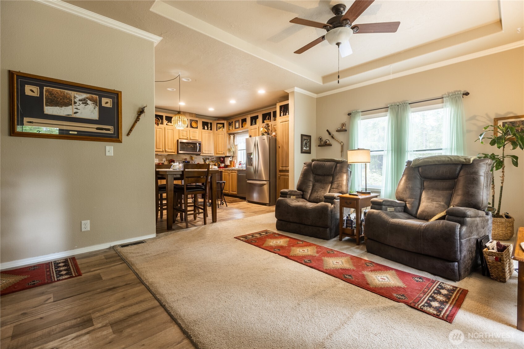 20 Northeast Mallard Way Hoodsport, WA 98548 - Photo 7 of 23 a living room with furniture and a flat screen tv