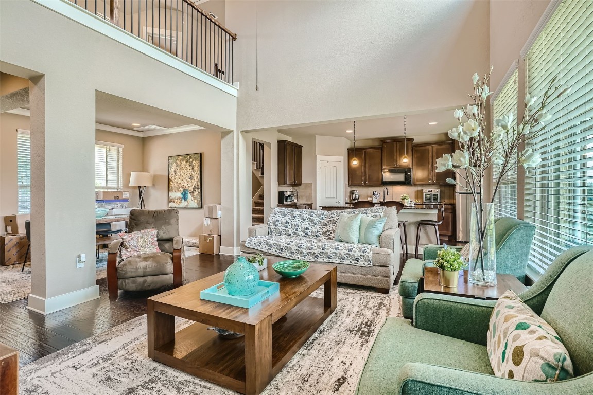 9401 McKnight Loop, Unit 6 Austin, TX 78717 - Photo 14 of 28 a living room with furniture and a view of kitchen