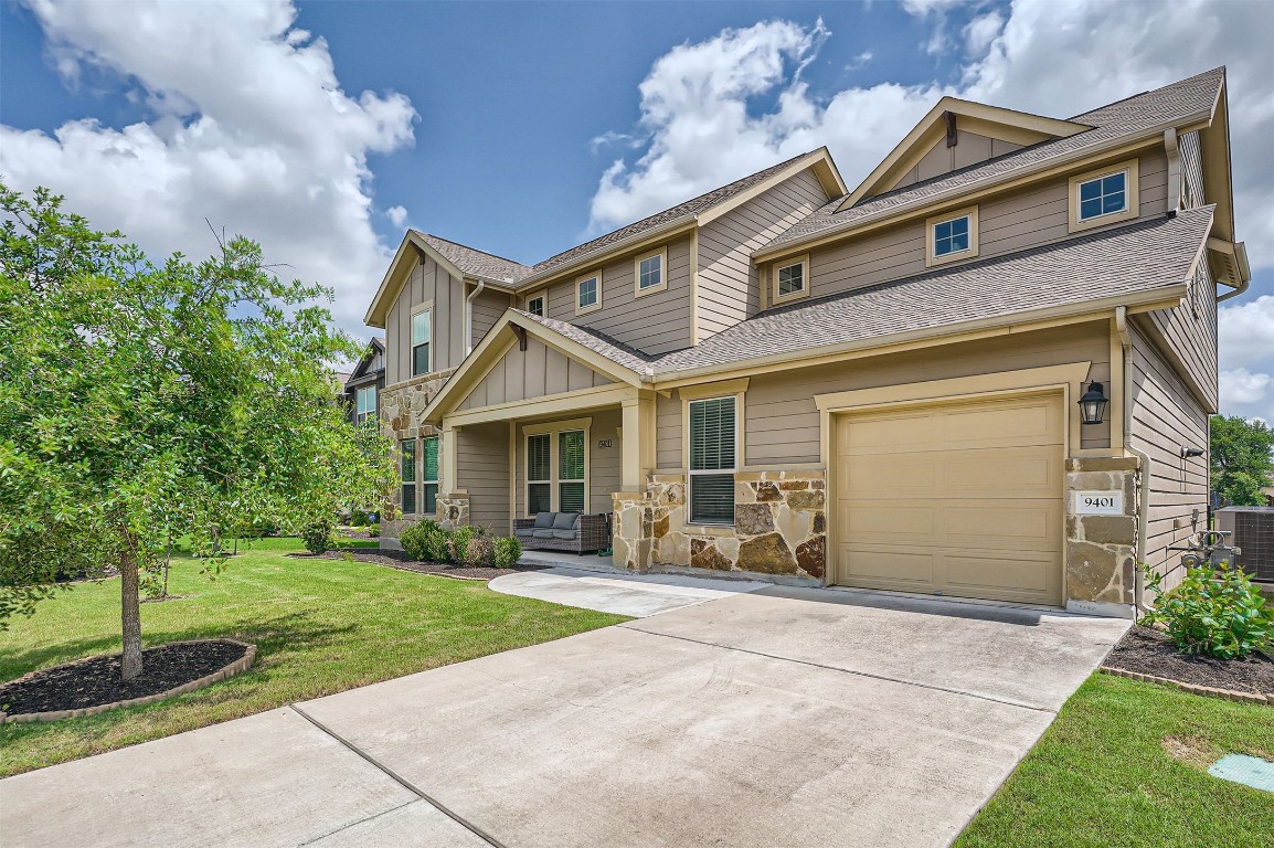 9401 McKnight Loop, Unit 6 Austin, TX 78717 - Photo 2 of 28 front view of a house with a yard