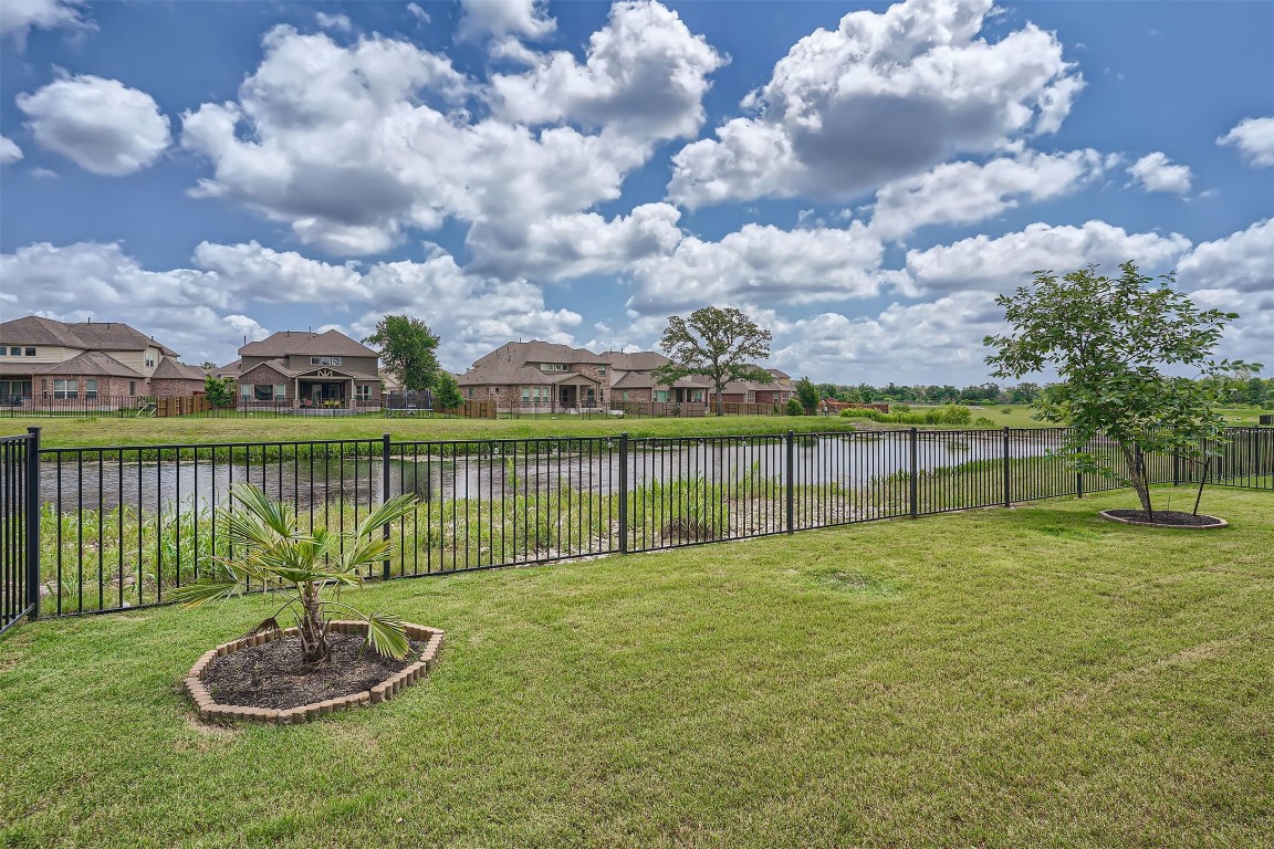 9401 McKnight Loop, Unit 6 Austin, TX 78717 - Photo 28 of 28 a view of a garden with a slide
