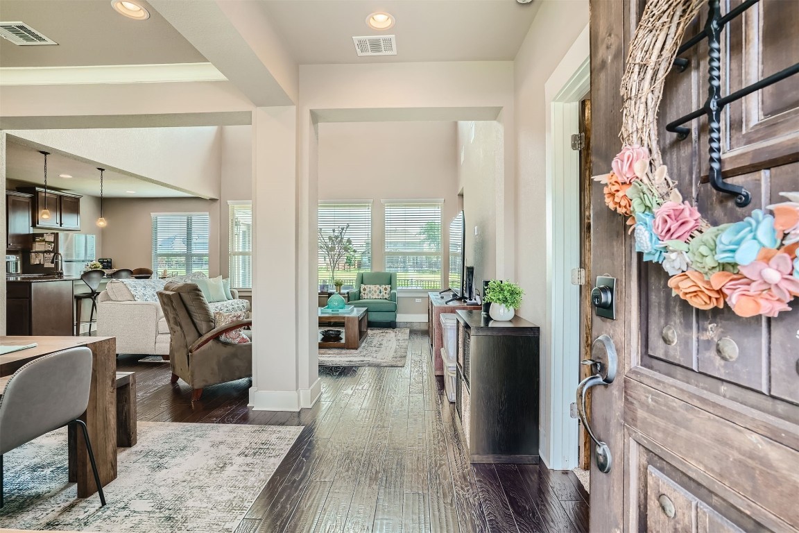 9401 McKnight Loop, Unit 6 Austin, TX 78717 - Photo 5 of 28 a living room with furniture and a floor to ceiling window