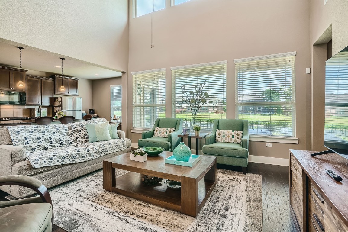 9401 McKnight Loop, Unit 6 Austin, TX 78717 - Photo 7 of 28 a living room with furniture and a large window