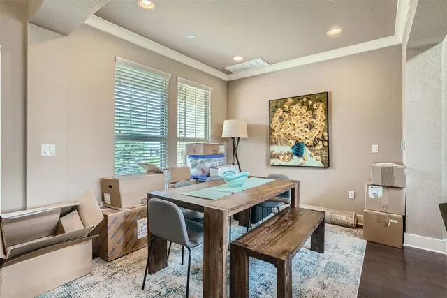 a workspace with furniture and wooden floor