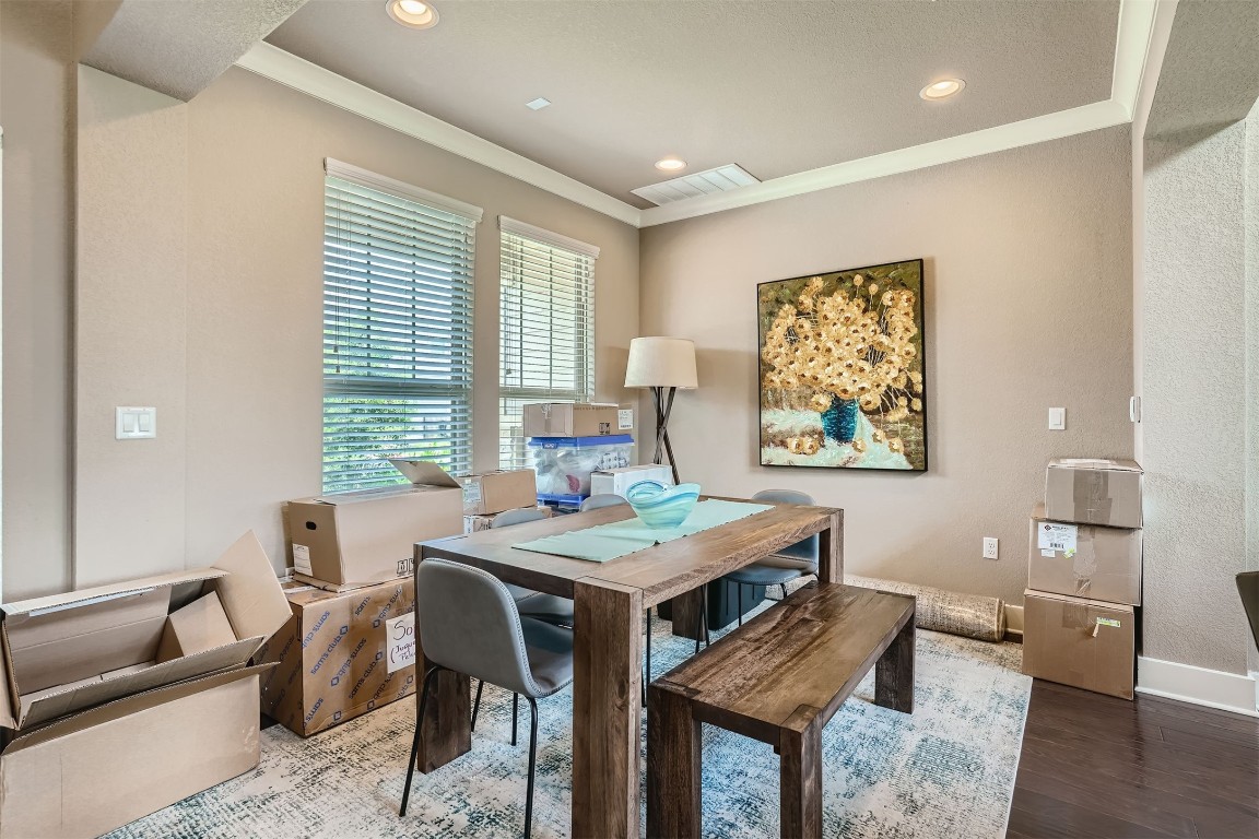9401 McKnight Loop, Unit 6 Austin, TX 78717 - Photo 8 of 28 a view of a dining room with furniture and wooden floor