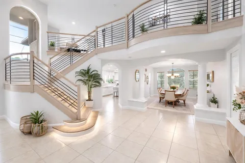 a view of entryway livingroom and hall