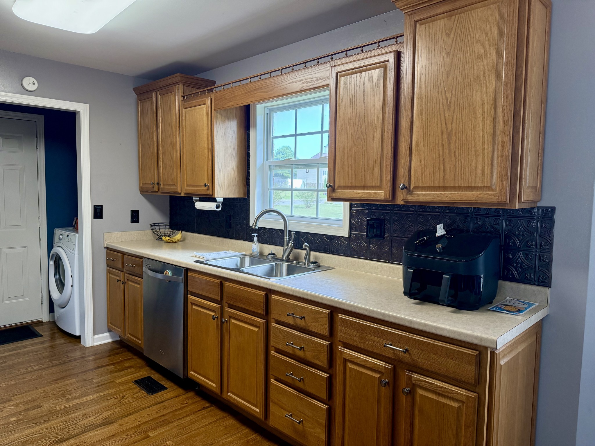125 Maple Ridge Court McMinnville, TN 37110 - Photo 11 of 44 a kitchen with stainless steel appliances granite countertop a sink a stove and a refrigerator