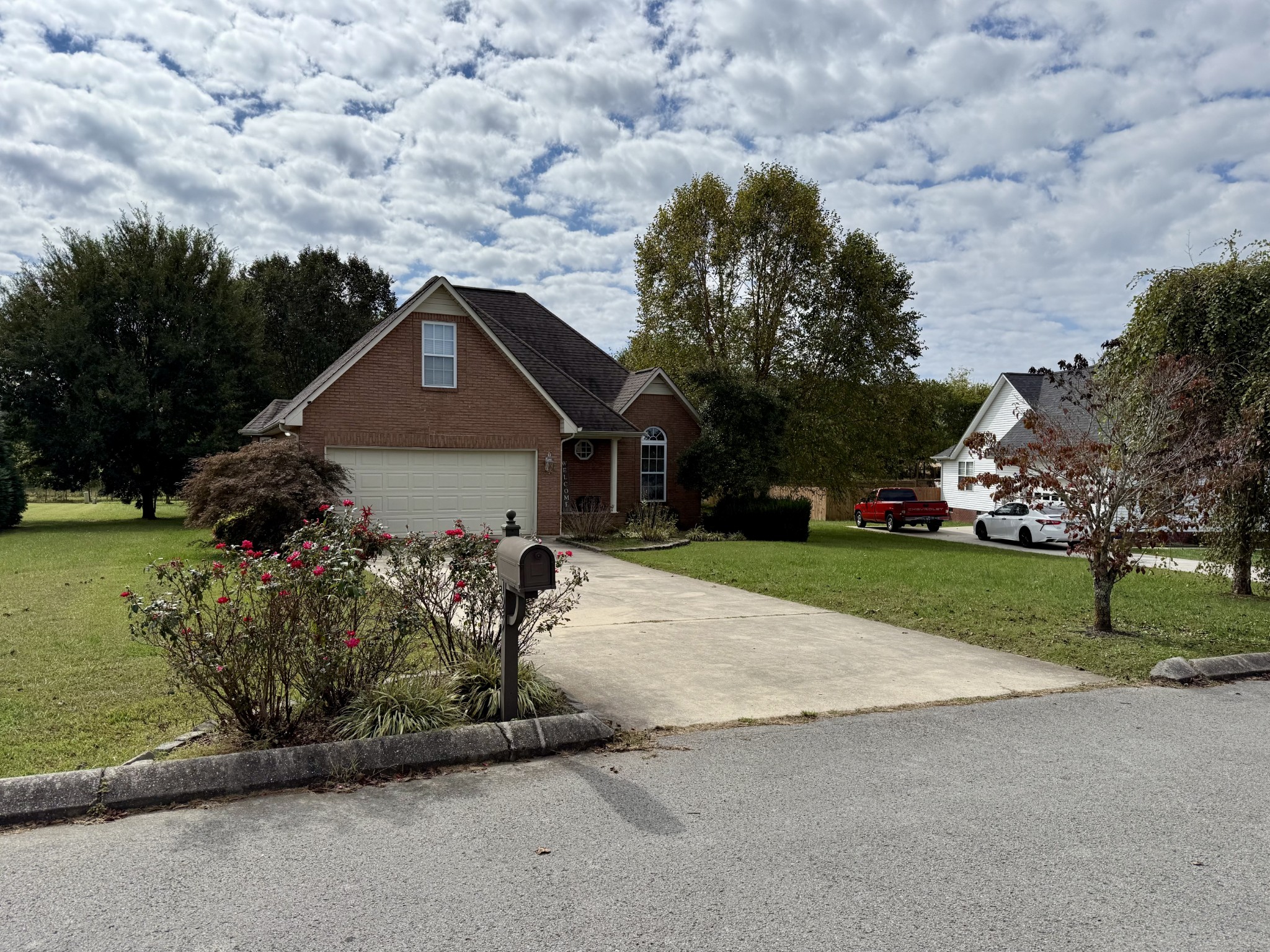 125 Maple Ridge Court McMinnville, TN 37110 - Photo 2 of 44 a front view of a house with a yard