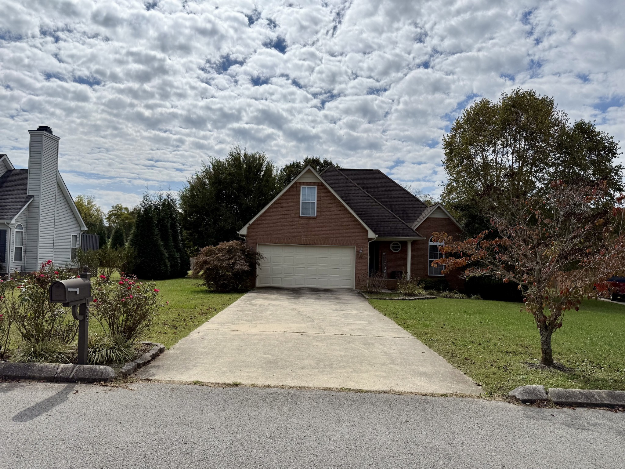 125 Maple Ridge Court McMinnville, TN 37110 - Photo 3 of 44 a house with trees in the background