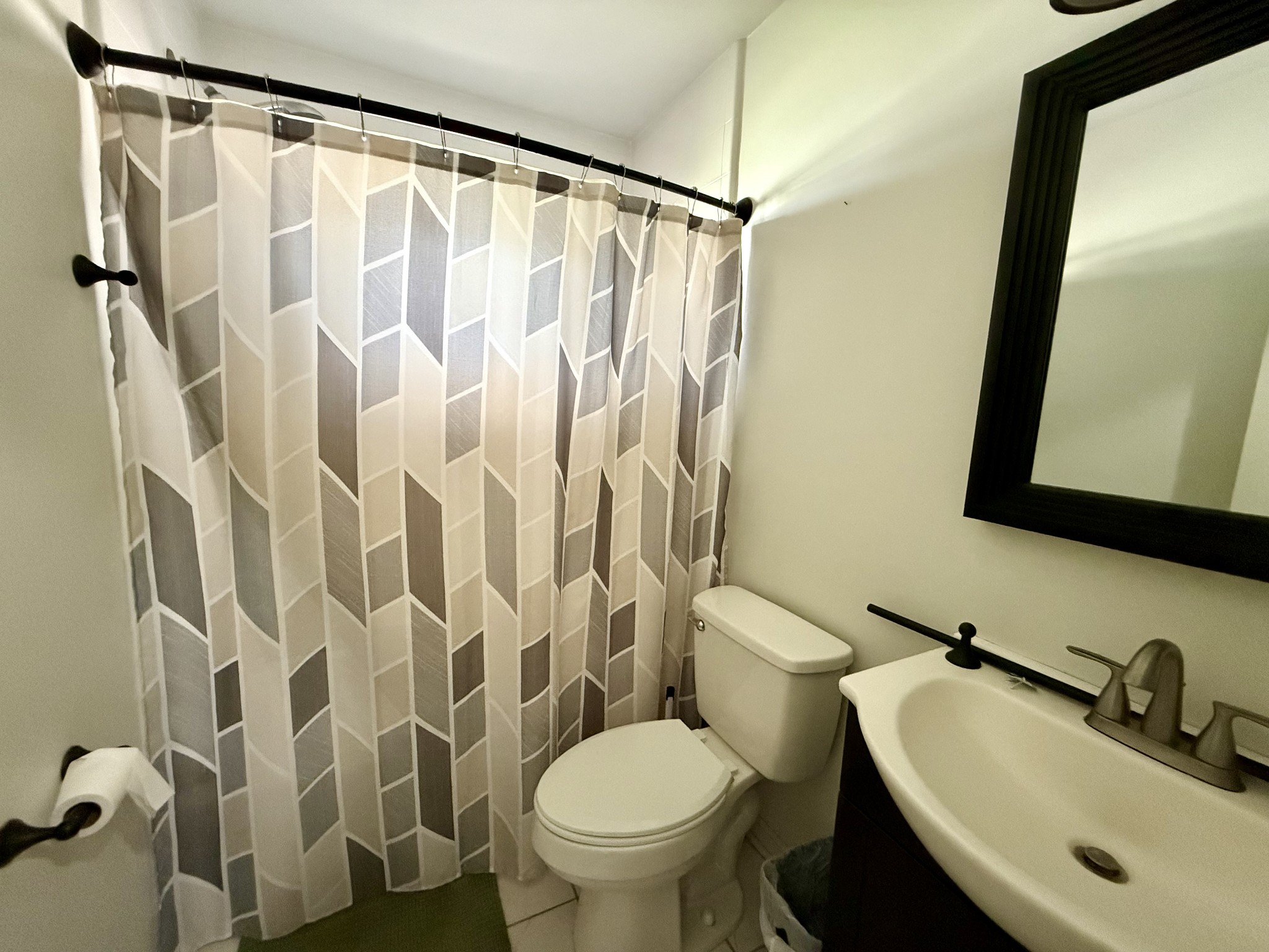 125 Maple Ridge Court McMinnville, TN 37110 - Photo 31 of 44 a bathroom with a sink and a mirror