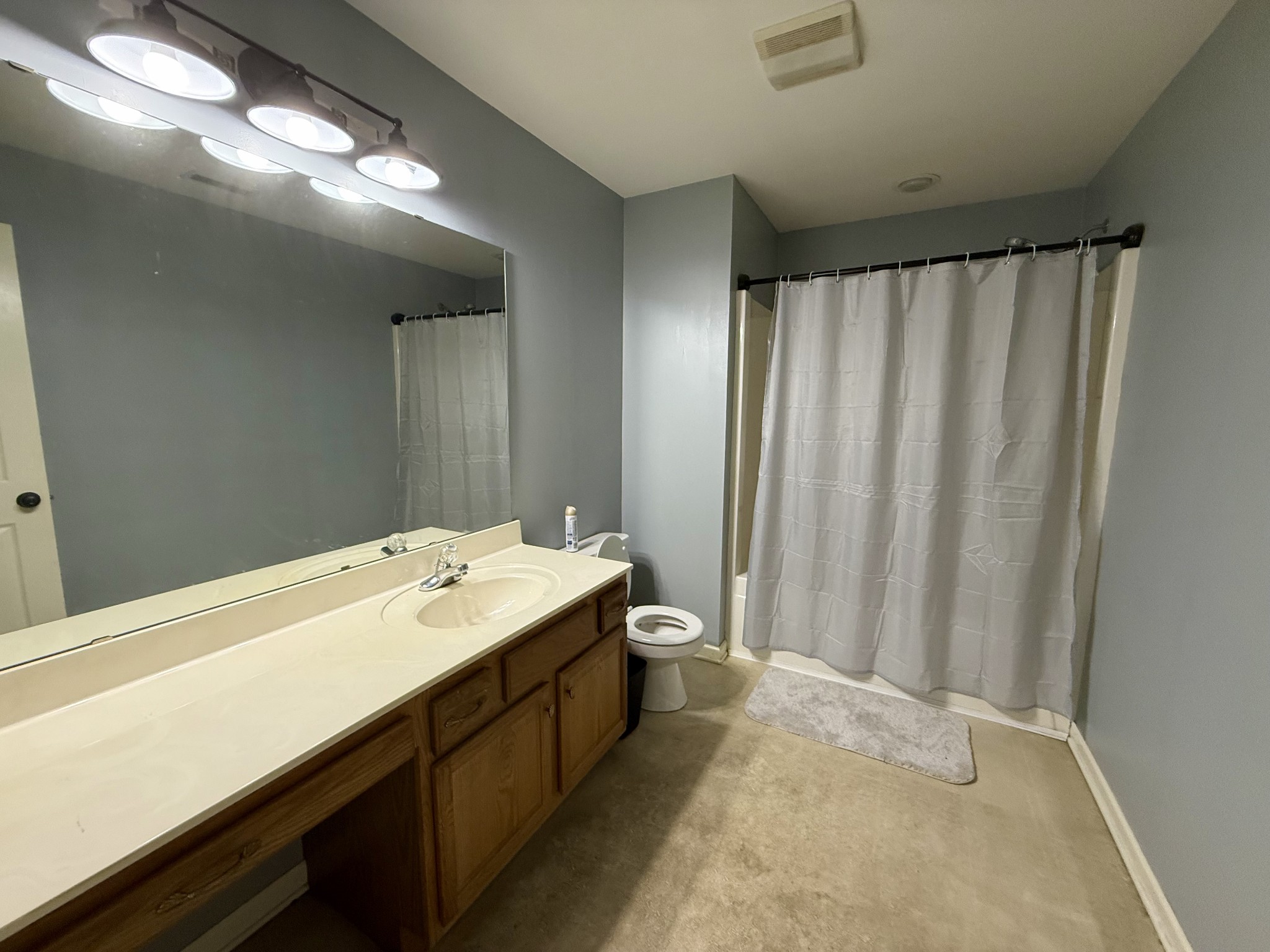 125 Maple Ridge Court McMinnville, TN 37110 - Photo 36 of 44 a bathroom with a sink and a mirror