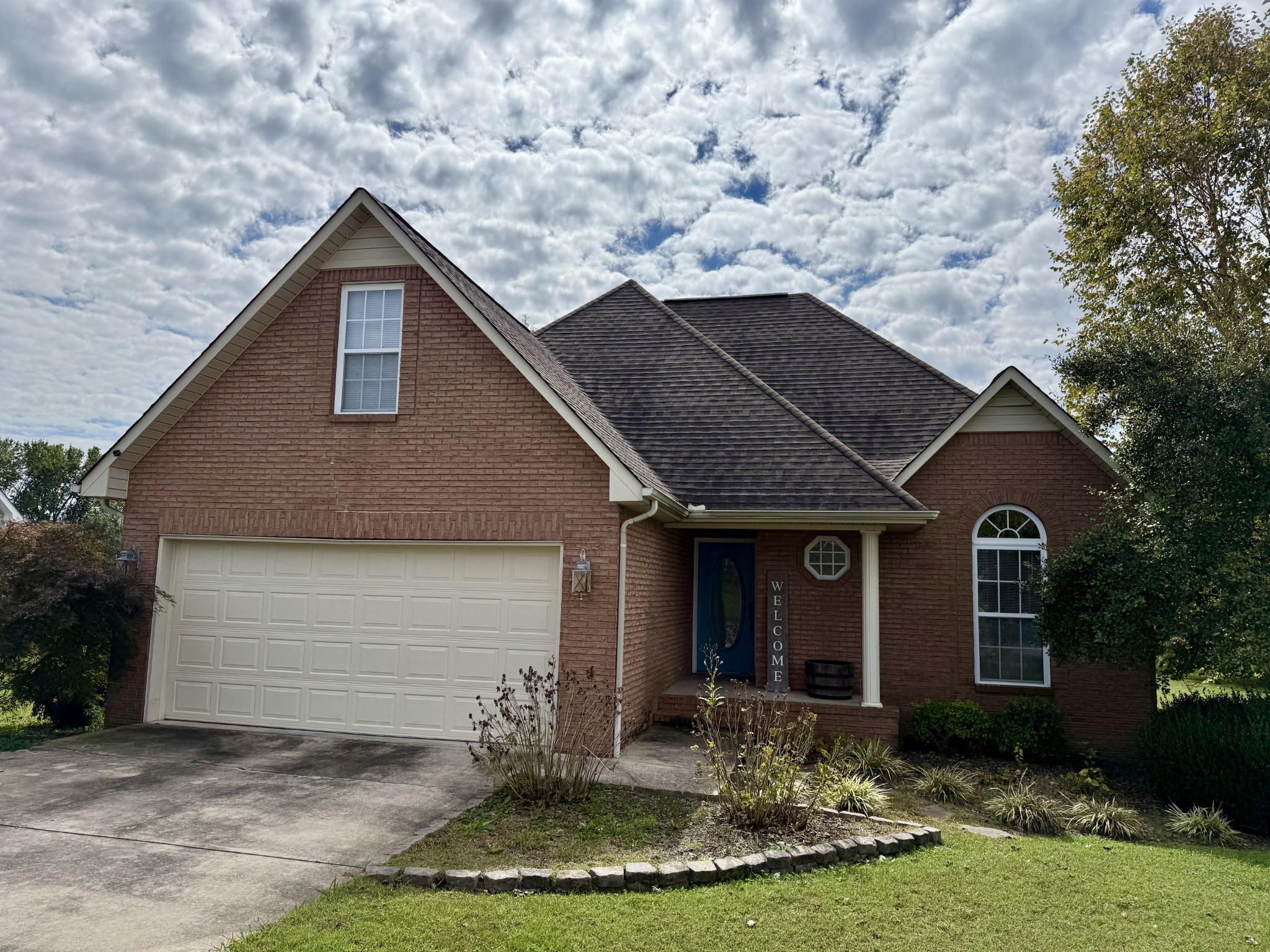125 Maple Ridge Court McMinnville, TN 37110 - Photo 40 of 44 a front view of a house with garden