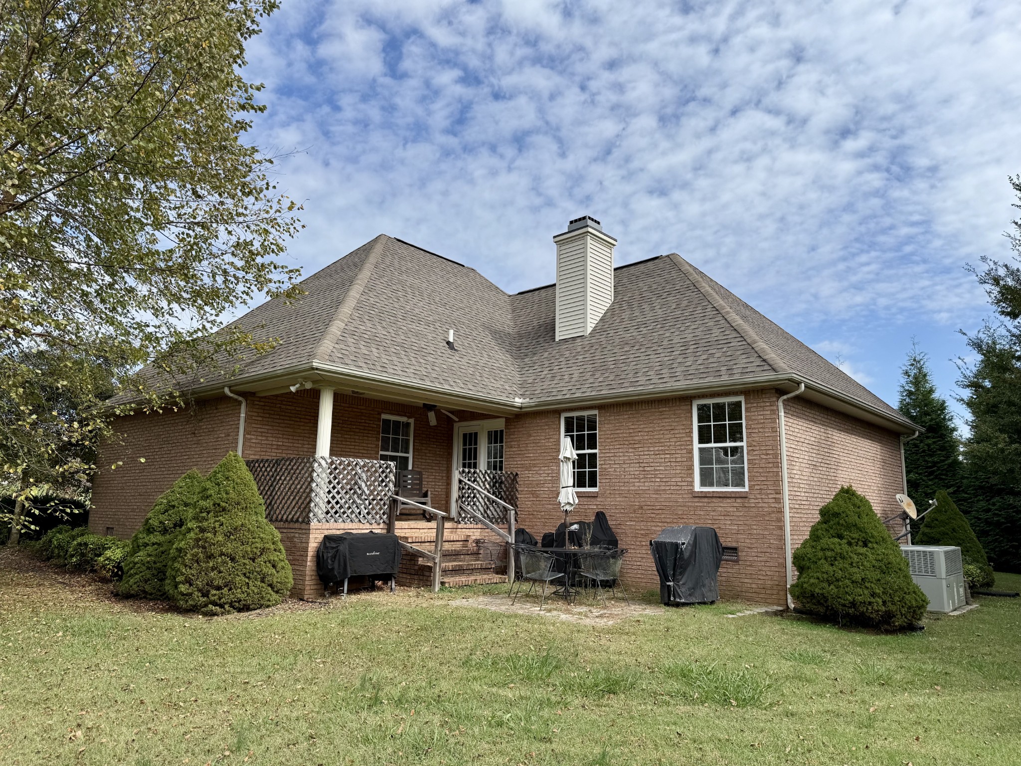 125 Maple Ridge Court McMinnville, TN 37110 - Photo 4 of 44 a view of a house with backyard and sitting area