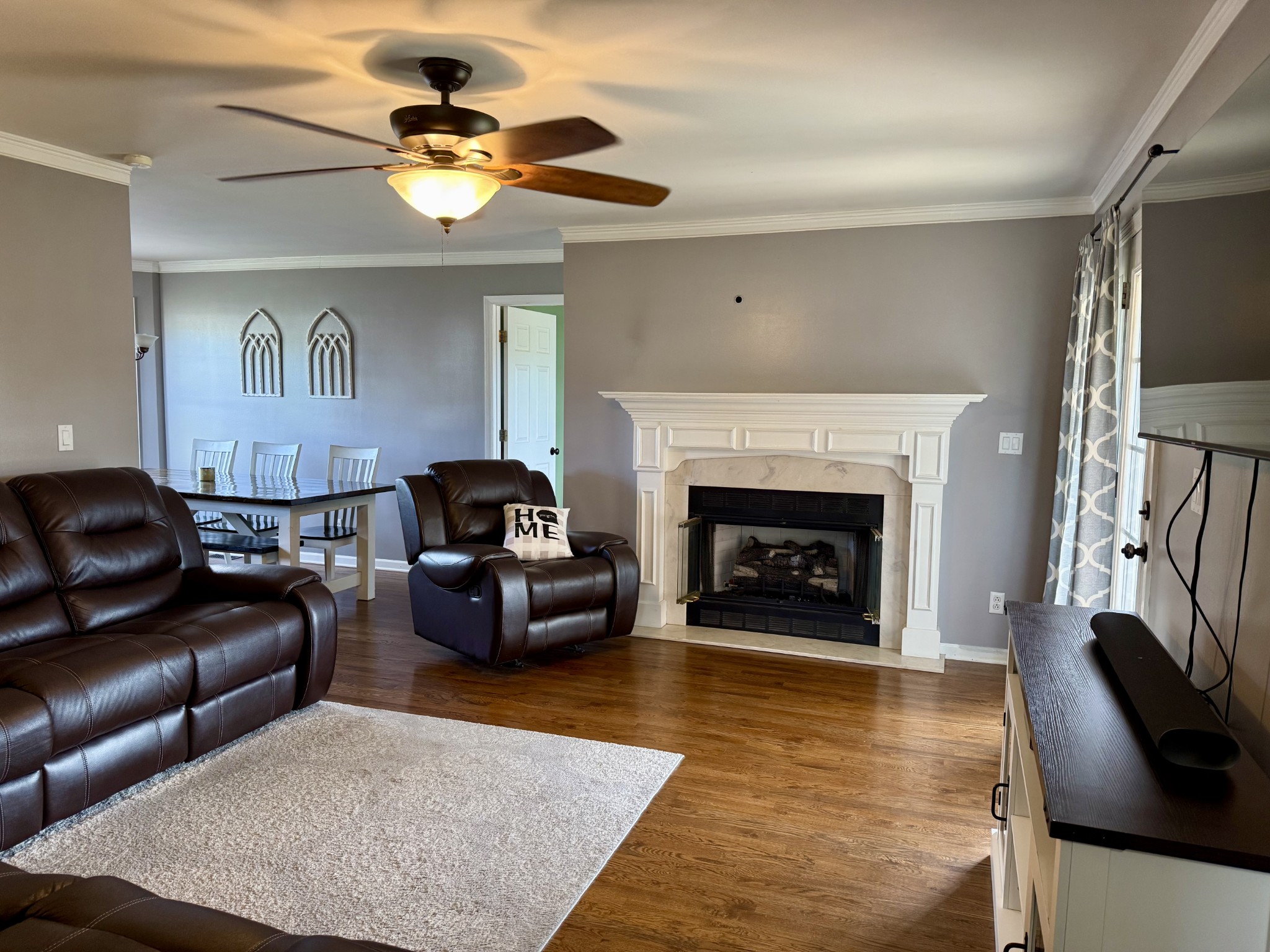 125 Maple Ridge Court McMinnville, TN 37110 - Photo 5 of 44 a living room with furniture and a fireplace