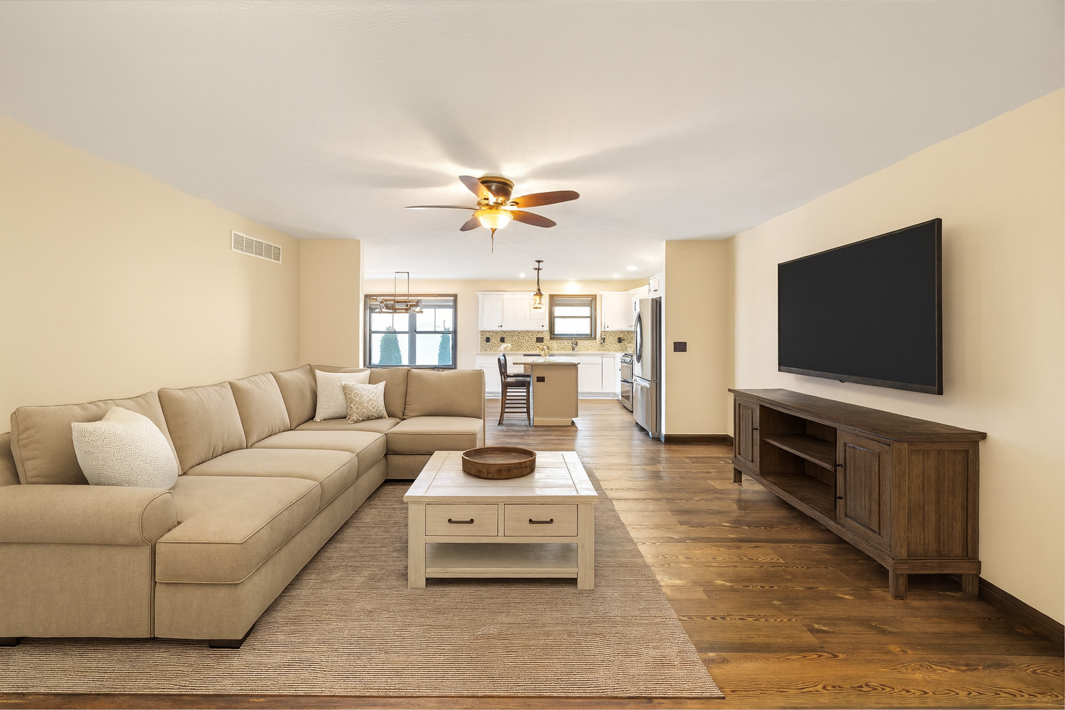 2172 Granby Lane Normal, IL 61761 - Photo 13 of 39 a living room with furniture and a flat screen tv