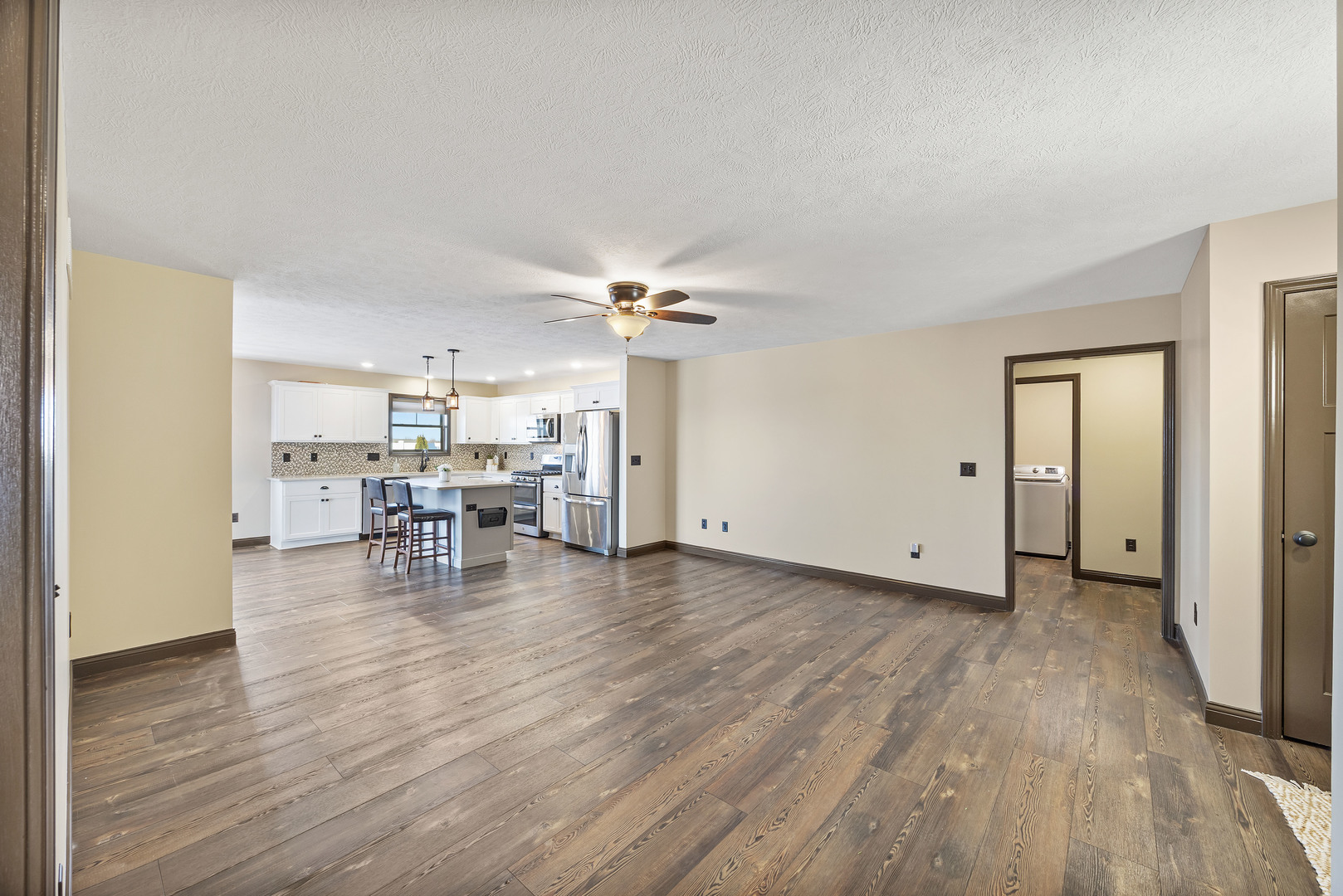 2172 Granby Lane Normal, IL 61761 - Photo 15 of 39 a view of a livingroom and dining room with wooden floor