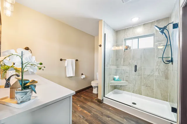a bathroom with a sink and mirror