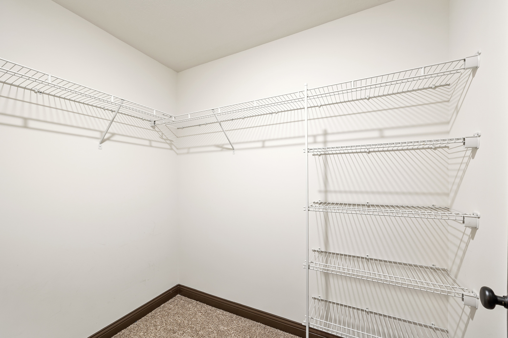 2172 Granby Lane Normal, IL 61761 - Photo 34 of 39 a view of a room with racks on the wall