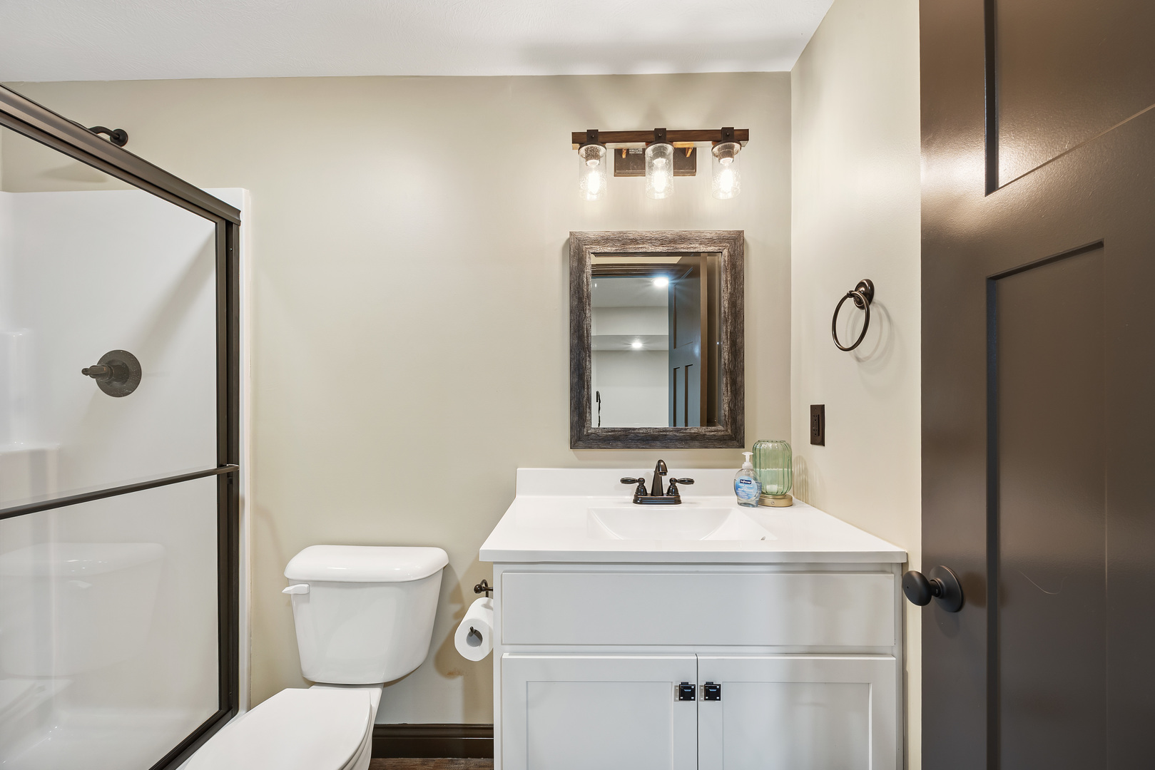 2172 Granby Lane Normal, IL 61761 - Photo 36 of 39 a bathroom with a sink toilet and shower