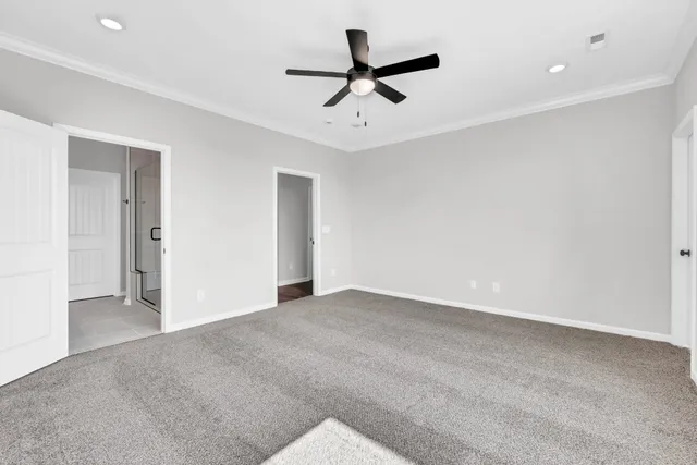 a view of room with ceiling fan