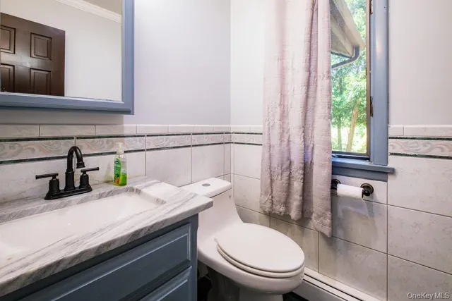 a room with a bed and a window