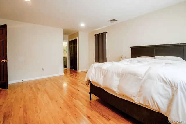 a bathroom with a sink a mirror a vanity and a window