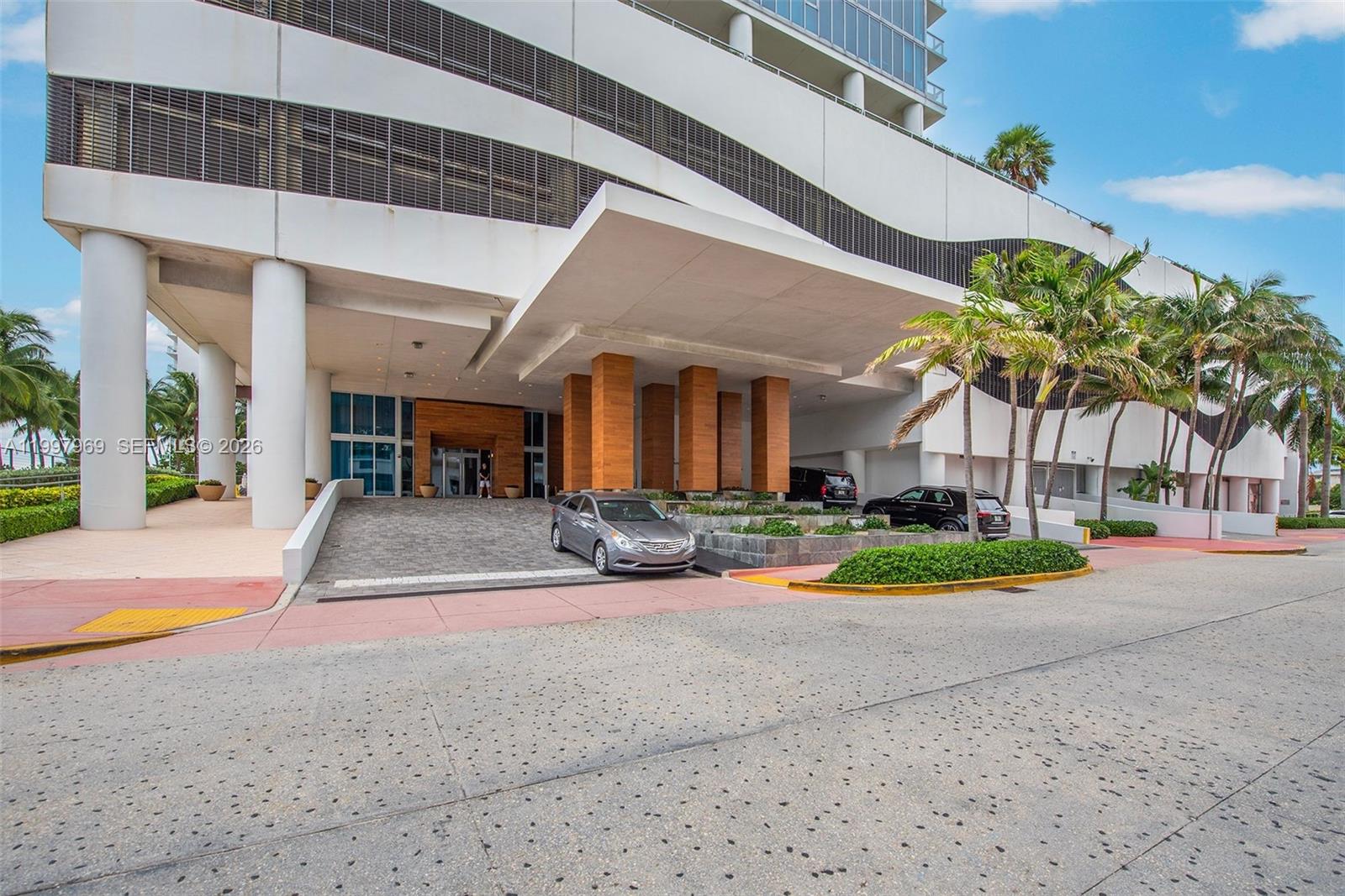 6899 Collins Avenue, Unit 1908 Miami Beach, FL 33141 - Photo 39 of 63 a view of a building with a patio