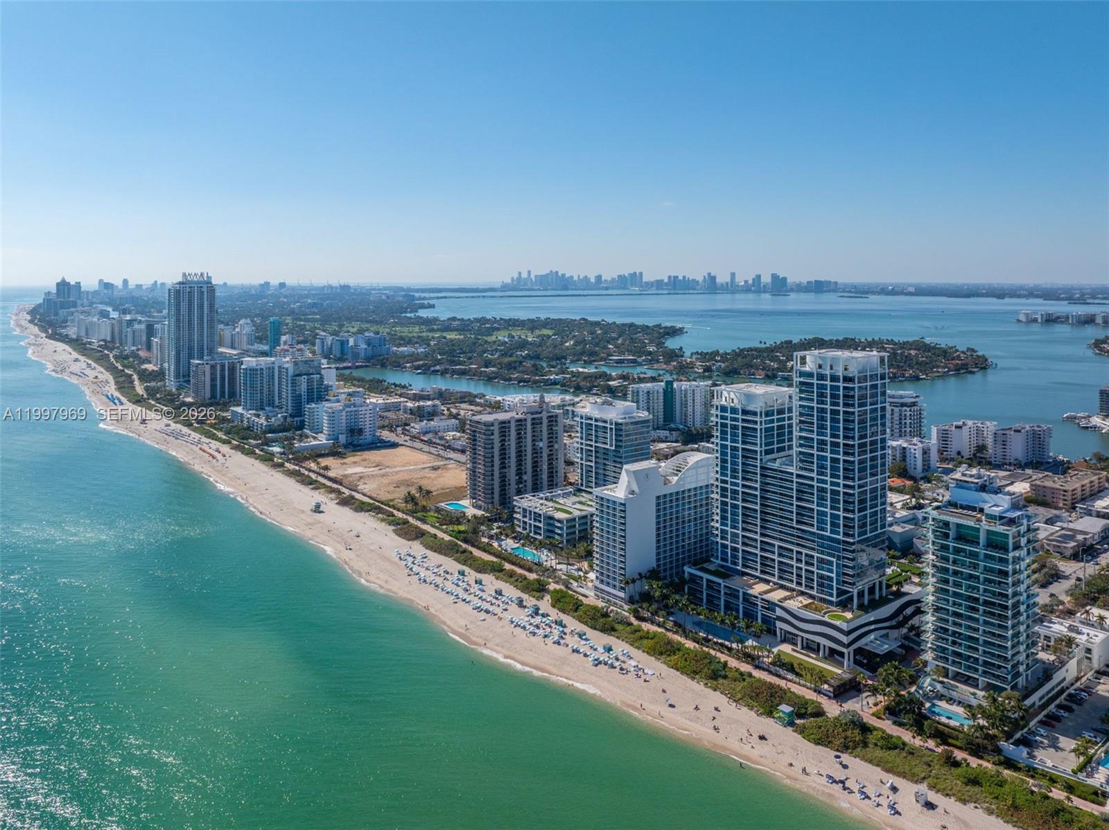 6899 Collins Avenue, Unit 1908 Miami Beach, FL 33141 - Photo 61 of 63 a city view with tall buildings