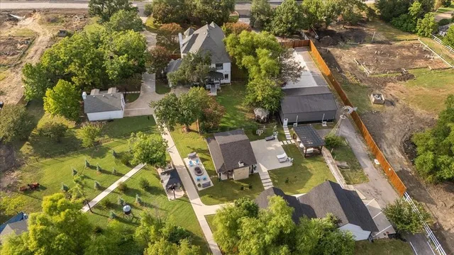 an aerial view of residential house with outdoor space