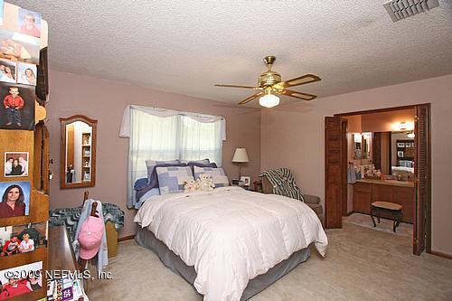4482 Tumbleweed Road Middleburg, FL 32068 - Photo 9 of 13 Master Bed