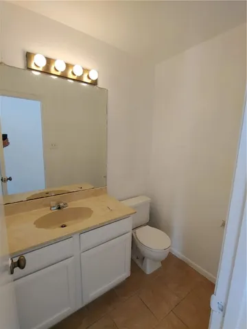 a bathroom with a sink and a toilet