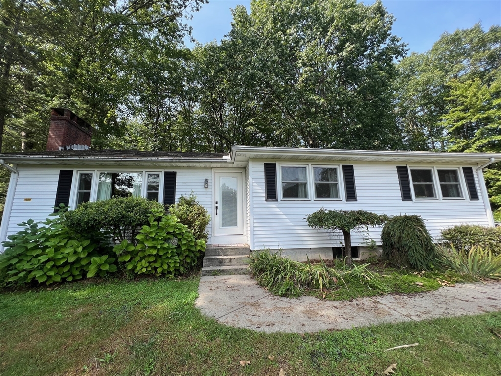 629 Florence Road Northampton, MA 01062 - Photo 1 of 36 a front view of house with a garden