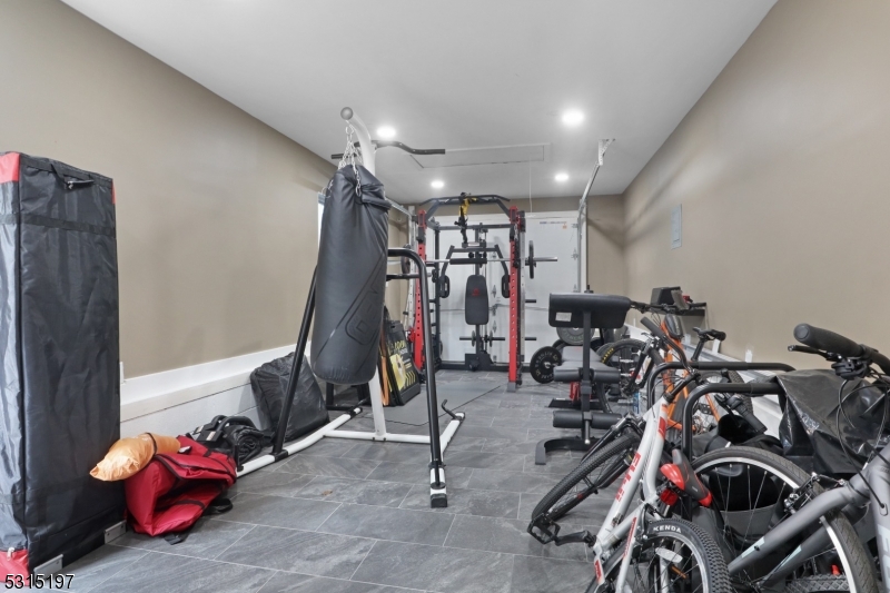 737 Jackson Avenue, Unit 2 Elizabeth, NJ 07201 - Photo 13 of 14 a view of a room with gym equipment