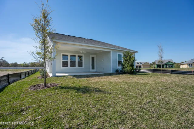 a house view with a garden space