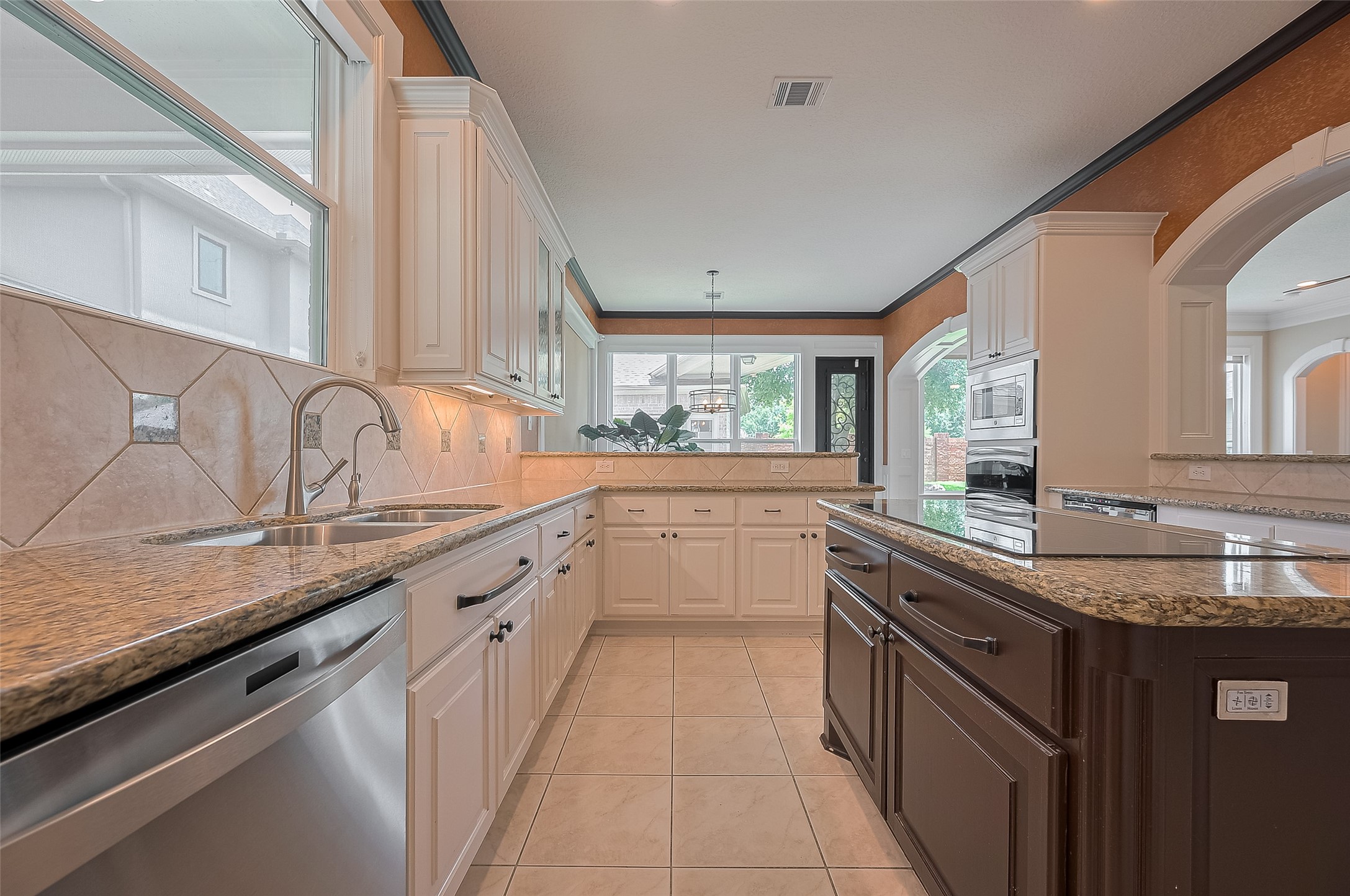 11826 Legend Manor Drive Houston, TX 77082 - Photo 18 of 43 Wonderful natural light through the island kitchen.
