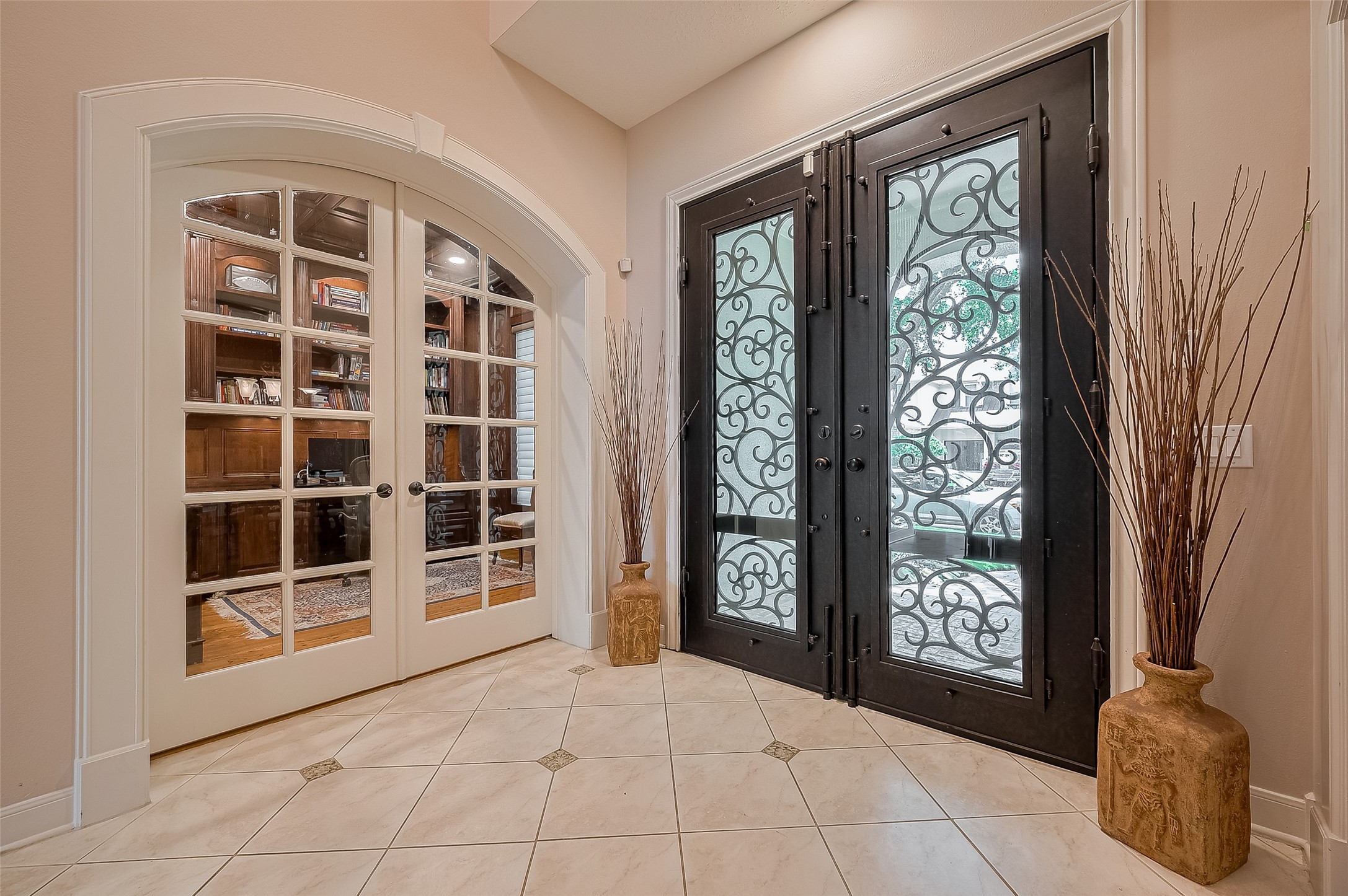 11826 Legend Manor Drive Houston, TX 77082 - Photo 7 of 43 Opposite side of the home's foyer are double glass French doors leading to a private home office.