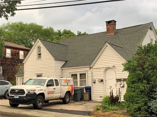 a view of a house with a street