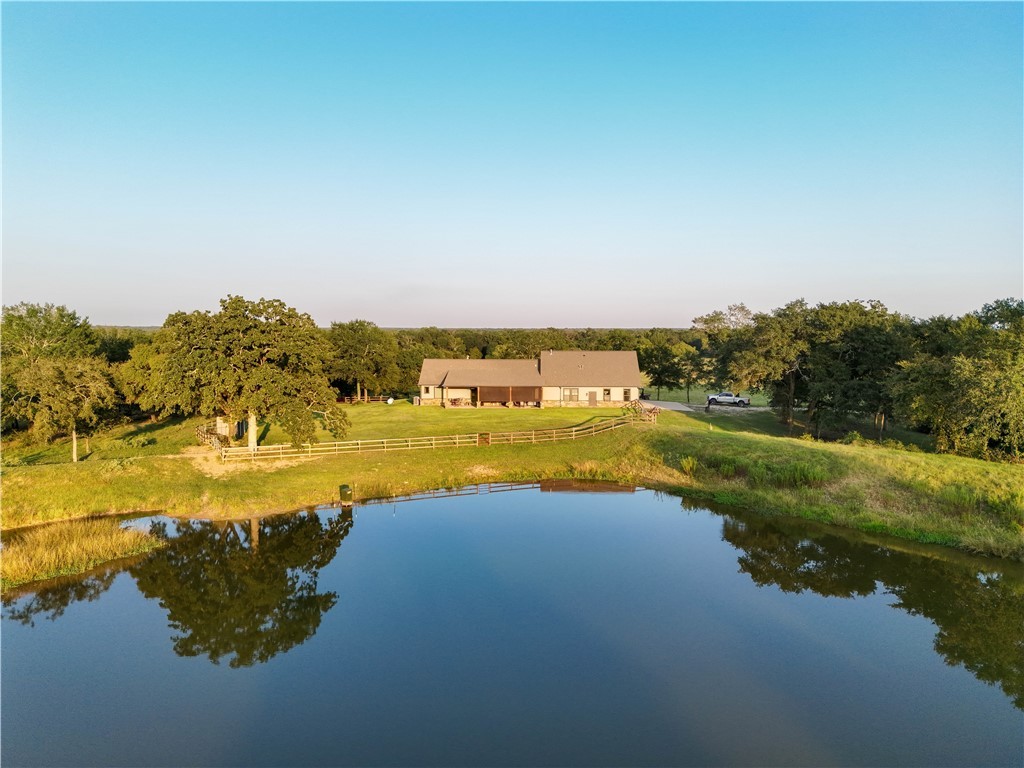 a view of a lake with houses in ocean
