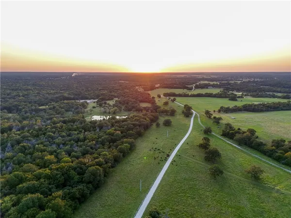 a view of a lake with a city