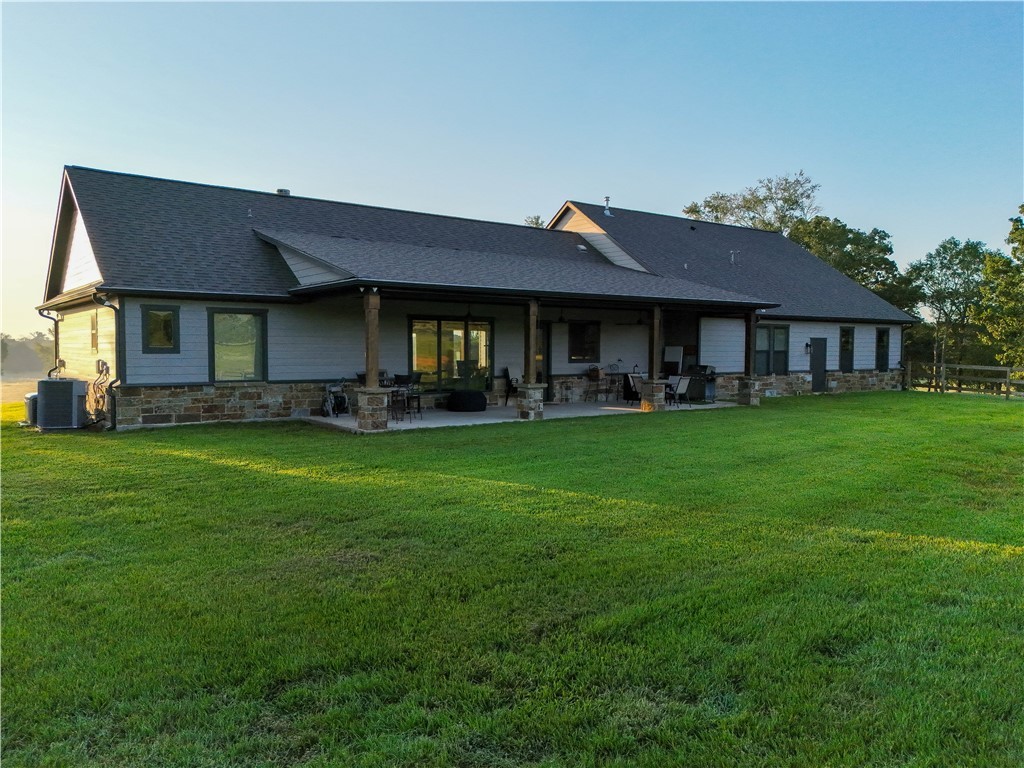 17497-495 Wilson Pasture Road Bryan, TX 77808 - Photo 16 of 50 a front view of a house with garden