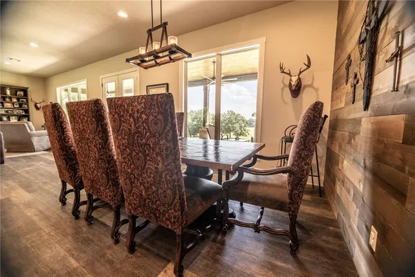 a view of a livingroom with furniture window and wooden floor