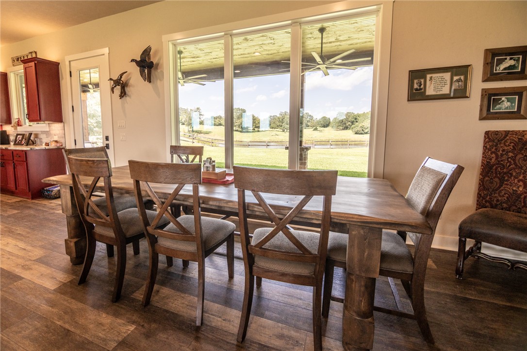 17497-495 Wilson Pasture Road Bryan, TX 77808 - Photo 23 of 50 a view of a dining room with furniture window and outside view