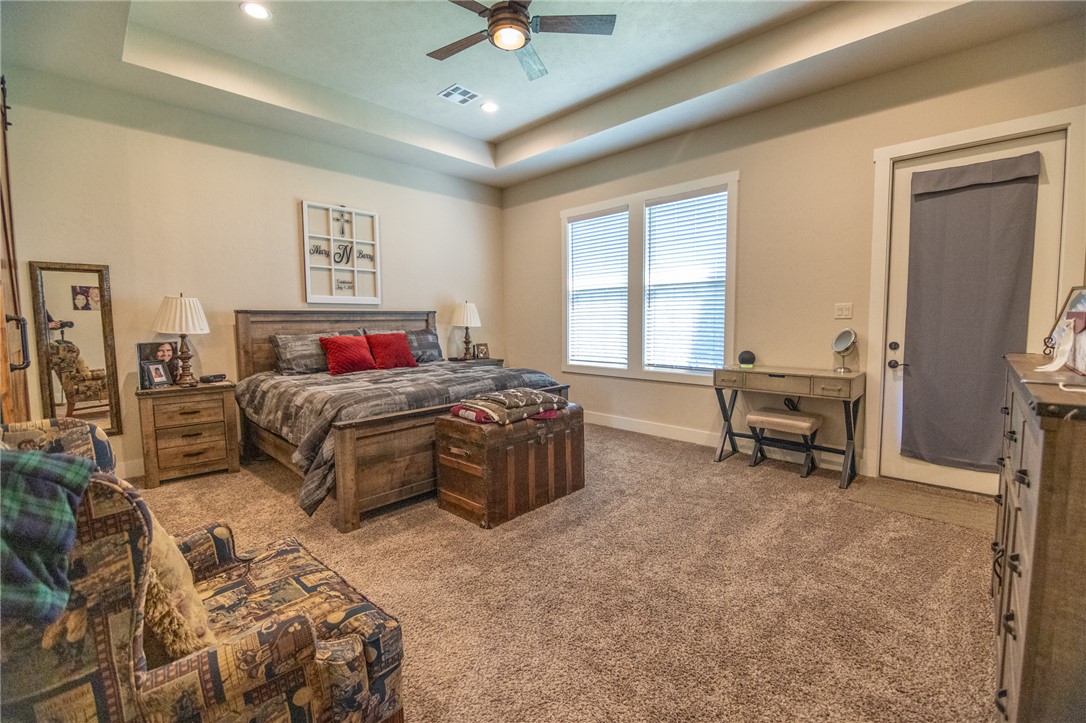 17497-495 Wilson Pasture Road Bryan, TX 77808 - Photo 25 of 50 a living room with furniture and a window