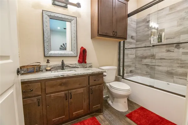 a view of a garden with a swimming pool