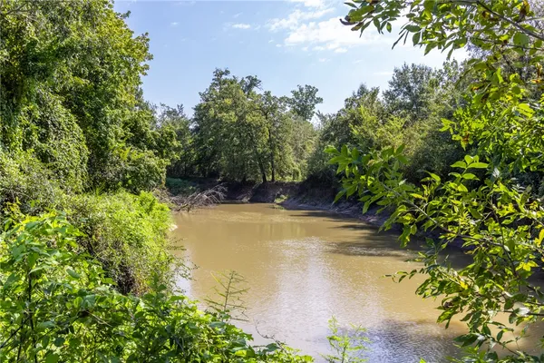 a view of a swimming pool with an outdoor space