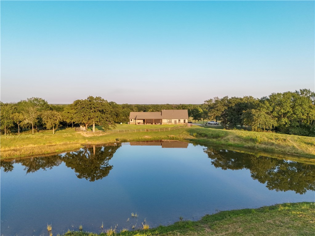 17497-495 Wilson Pasture Road Bryan, TX 77808 - Photo 50 of 50 a view of a lake with a city