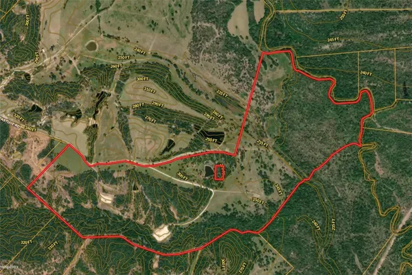 an aerial view of a tennis space