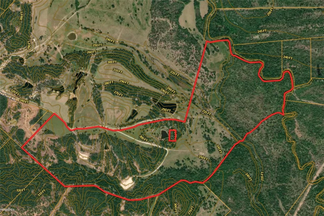 17497-495 Wilson Pasture Road Bryan, TX 77808 - Photo 9 of 50 an aerial view of a tennis space