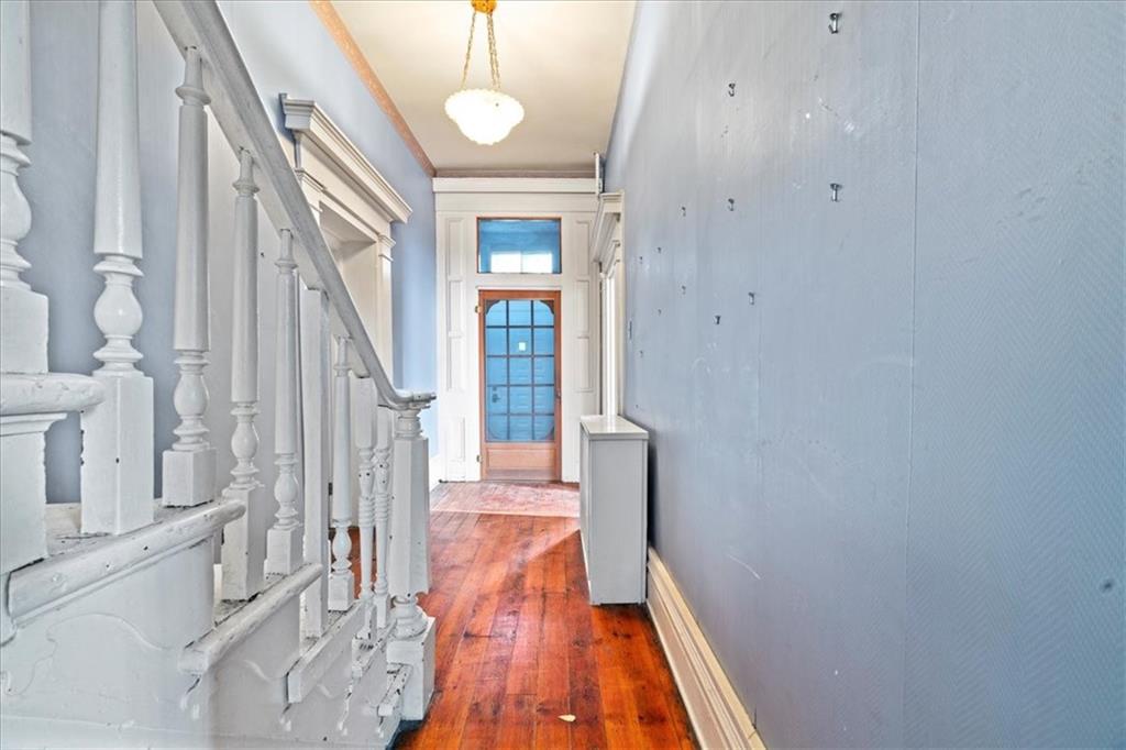 1947 South 18th Street Pittsburgh, PA 15203 - Photo 13 of 48 a view of a hallway with wooden floor and staircase